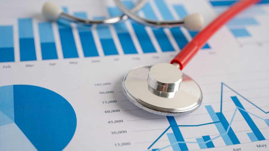 Stethoscope on Mississippi truck accident statistics charts, highlighting the health impacts and trends in truck-related incidents.